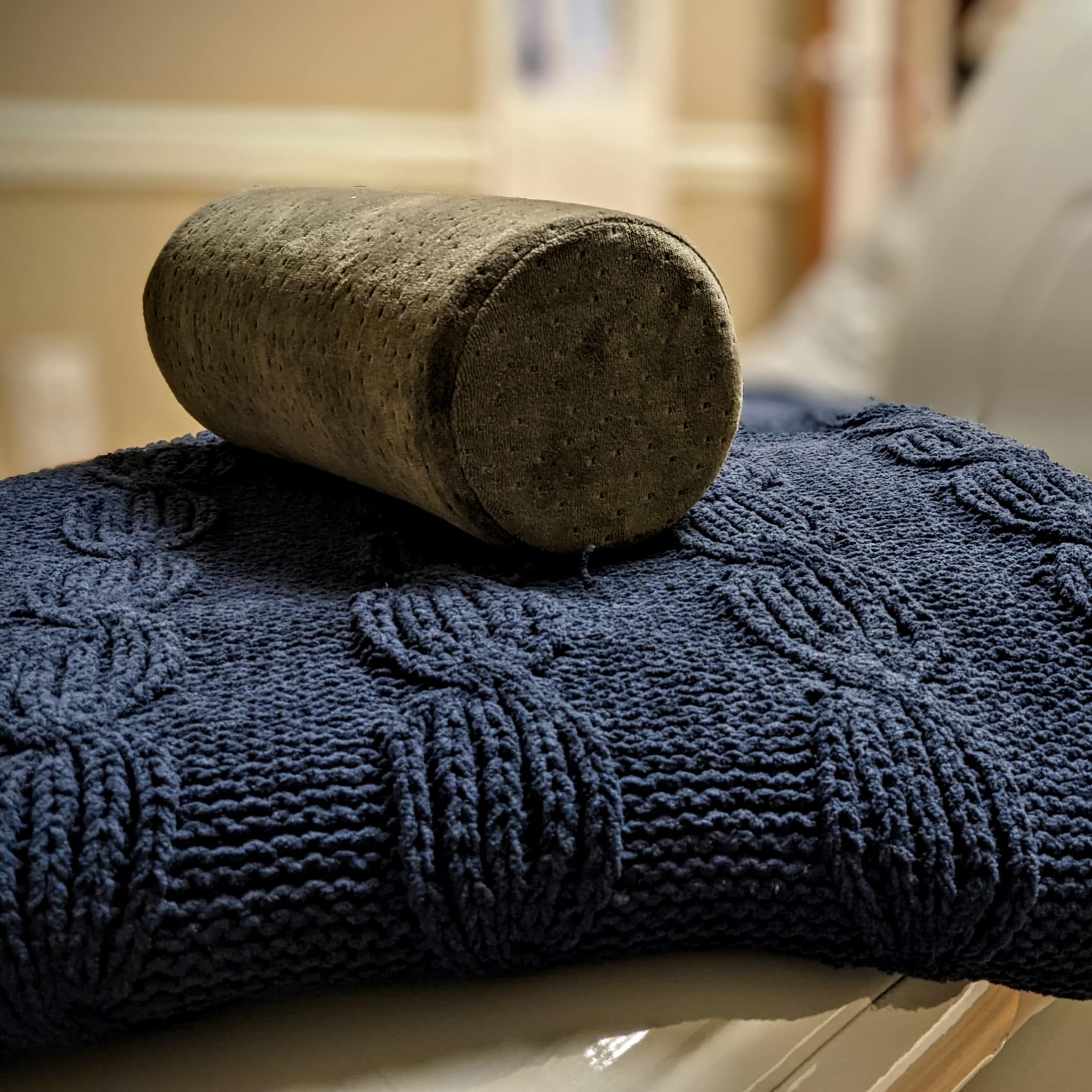 Folded blanket and pillow ready for a patient